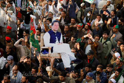 FILE PHOTO: Supporters of the former Pakistani Prime Minister Imran Khan protest against what they call a black day during a rally in Swabi