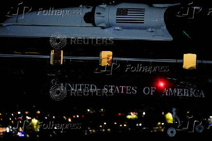 Marine One, carrying U.S. President Donald Trump and U.S. Treasury Secretary Scott Bessent, arrives at the Wall Street Landing Zone