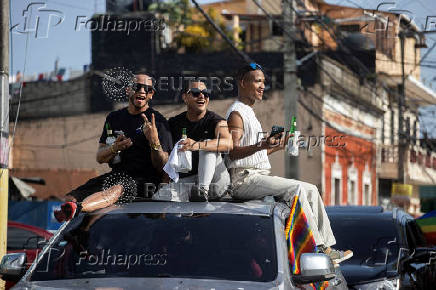 People attend the annual Pride Parade in Santo Domingo