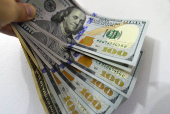 Dólar tem nova disparada e fecha em recorde de R$ 6,26
