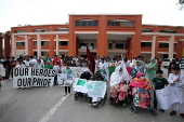 People protest against India in Peshawar
