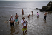 People celebrate Saint John the Baptist, in Ocumare de la costa