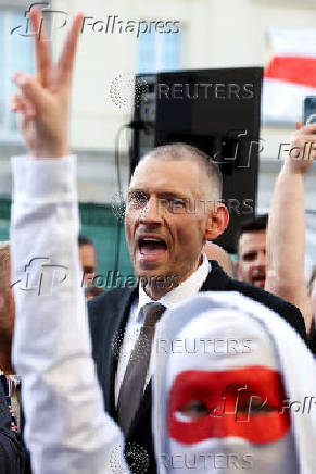 Siarhei Tsikhanouski attends a rally organised by Belarusian diaspora in Warsaw
