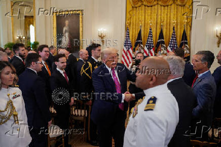 U.S. President Trump participates in a signing ceremony for the 