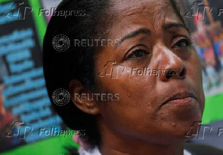 Family members of migrants imprisoned in El Salvador protest outside the United Nations building, in Caracas