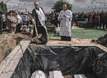 Ukraine bids farewell to three children killed in Russian attack in Zhytomyr region