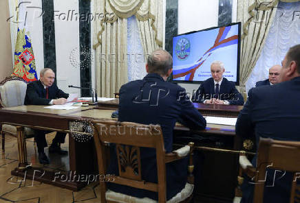 Russia's President Putin chairs a meeting with senior officials and military commanders in Moscow