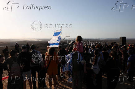 Israeli right wing activists take part in a rally organized by settlers groups to promote Israel's resettling in Gaza