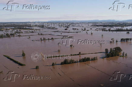 A drone view shows a flooded area near the Hunter River in Heatherbrae