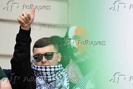 Member of Irish rap group Kneecap in UK court on terrorism charge