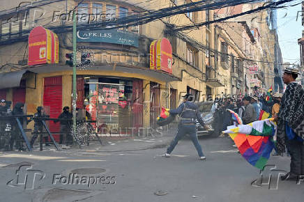 Supporters of Evo Morales's candidacy clash with police, in La Paz