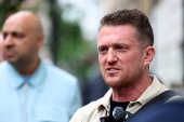 Political activist Tommy Robinson faces court over journalist harassment