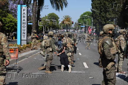 Protesters and federal agents clash after ICE raid in Paramount