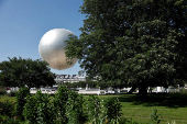The return of a new Paris 2024 flame cauldron set on a balloon to the Tuileries Garden and the Paris skyline