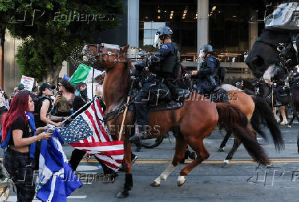 Protests against federal immigration sweeps continue, in Los Angeles