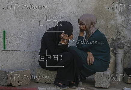 Palestinians mourn family killed in Israeli airstrike on Gaza refugee camp