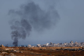 Smoke rises from Gaza, as seen from the Israel
