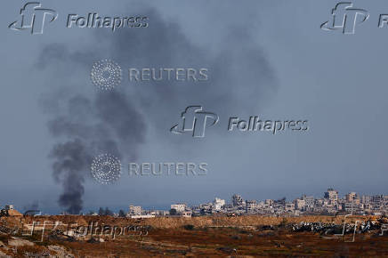 Smoke rises from Gaza, as seen from the Israel