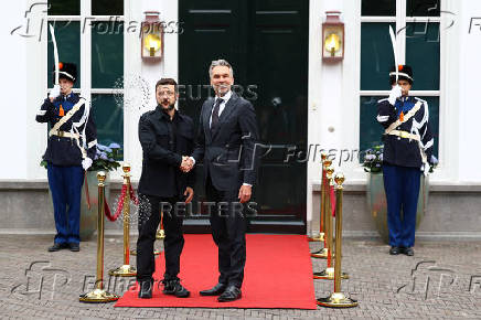 Dutch Prime Minister Dick Schoof meets with Ukrainian President Volodymyr Zelenskiy on the sidelines of a NATO Summit, in The Hague