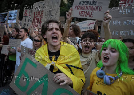 Ukrainians protest against a newly passed law, which curbs independence of anti-corruption institutions in Kyiv