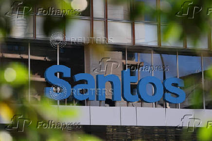 A Santos logo is visible outside their headquarters in Adelaide