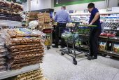 US President Trump's higher tariffs on trading partners take effect