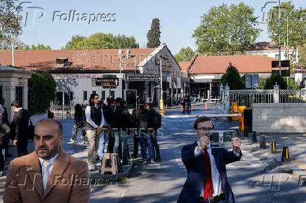 Journalists gather near the Turkish Presidency's Dolmabahce working office, where Russia and Ukraine direct talks might happen, in Istanbul