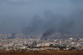 Smoke rises from northern Gaza, as seen from the Israeli side of the Israel-Gaza border
