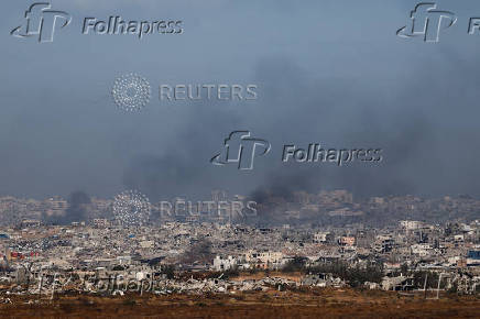 Smoke rises from northern Gaza, as seen from the Israeli side of the Israel-Gaza border
