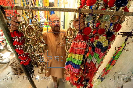 Roadside shop sells ornaments ahead of Eid al-Adha in Peshawar