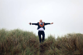 Member of the Orange Order reacts following a march along the beach in Rossnowlagh in County Donegal