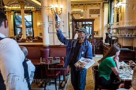 The last Newspaper Hawker in Paris to receive Order of Merit from President Macron