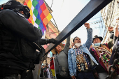 Supporters of Evo Morales's candidacy clash with police, in La Paz