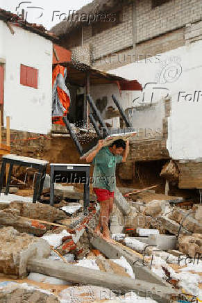 Erick weakens to tropical storm over Mexico, leaves trail of damage