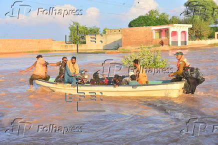 Thousands are evacuated as floods devastate parts of Punjab province