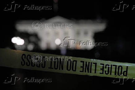 A police tape blocks off an area near the White House in Washington