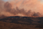 Firefighters tackle the Madre Fire near New Cuyama