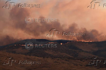 Firefighters tackle the Madre Fire near New Cuyama