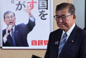 Japan's Prime Minister Ishiba speaks to media after meeting with the party's executives at the LDP headquarters in Tokyo