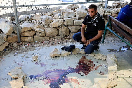 Aftermath of a clash with an Israeli settler at the village of Umm al-Khair near the West Bank city of Hebron