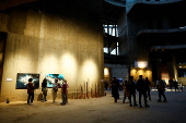 Visitors walk through the 