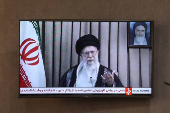 A TV screen displays the televised message of Iran's Supreme Leader, Ayatollah Ali Khamenei, during the Iran-Israel conflict in Tehran