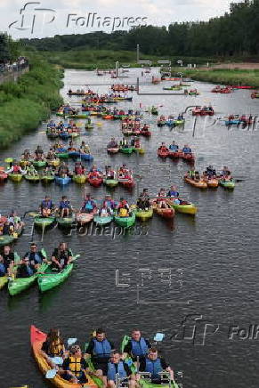 People attend Pilica Trail on Pilica River