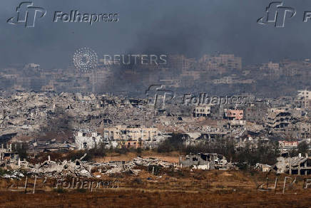Smoke rises from northern Gaza, as seen from the Israeli side of the Israel-Gaza border