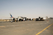 A general view of destroyed planes on the tarmac at Khartoum Airport, in Khartoum