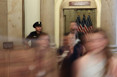 Visitors walk in the hallway outside of U.S. House Speaker Johnson?s offices at the U.S. Capitol in Washington