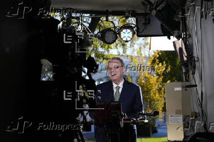 NEC director Kevin Hassett speaks to reporters outside the White House