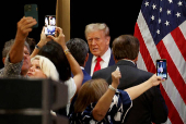 FILE PHOTO: Republican presidential nominee and former U.S. President Trump participates in a roundtable discussion with Latino community leaders in Doral