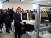 French President Macron inaugurates EssilorLuxottica laboratory in Wissous