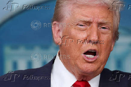 FILE PHOTO: U.S. President Trump meets members of the media at the White House in Washington, D.C